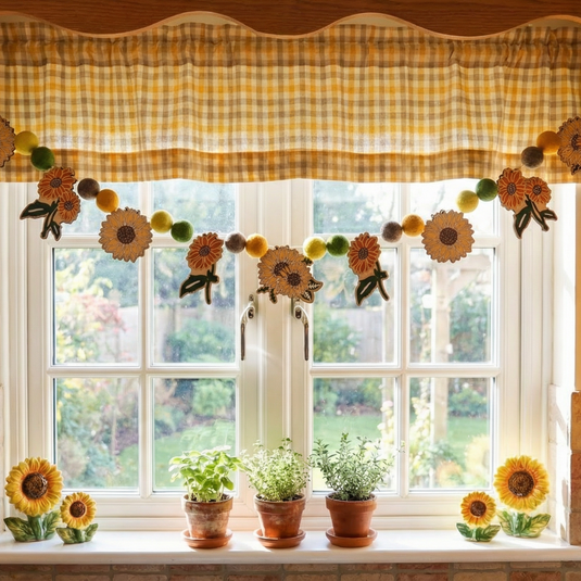 Completed Woodsy Craft Co. Garland Kit hanging in Kitchen Window